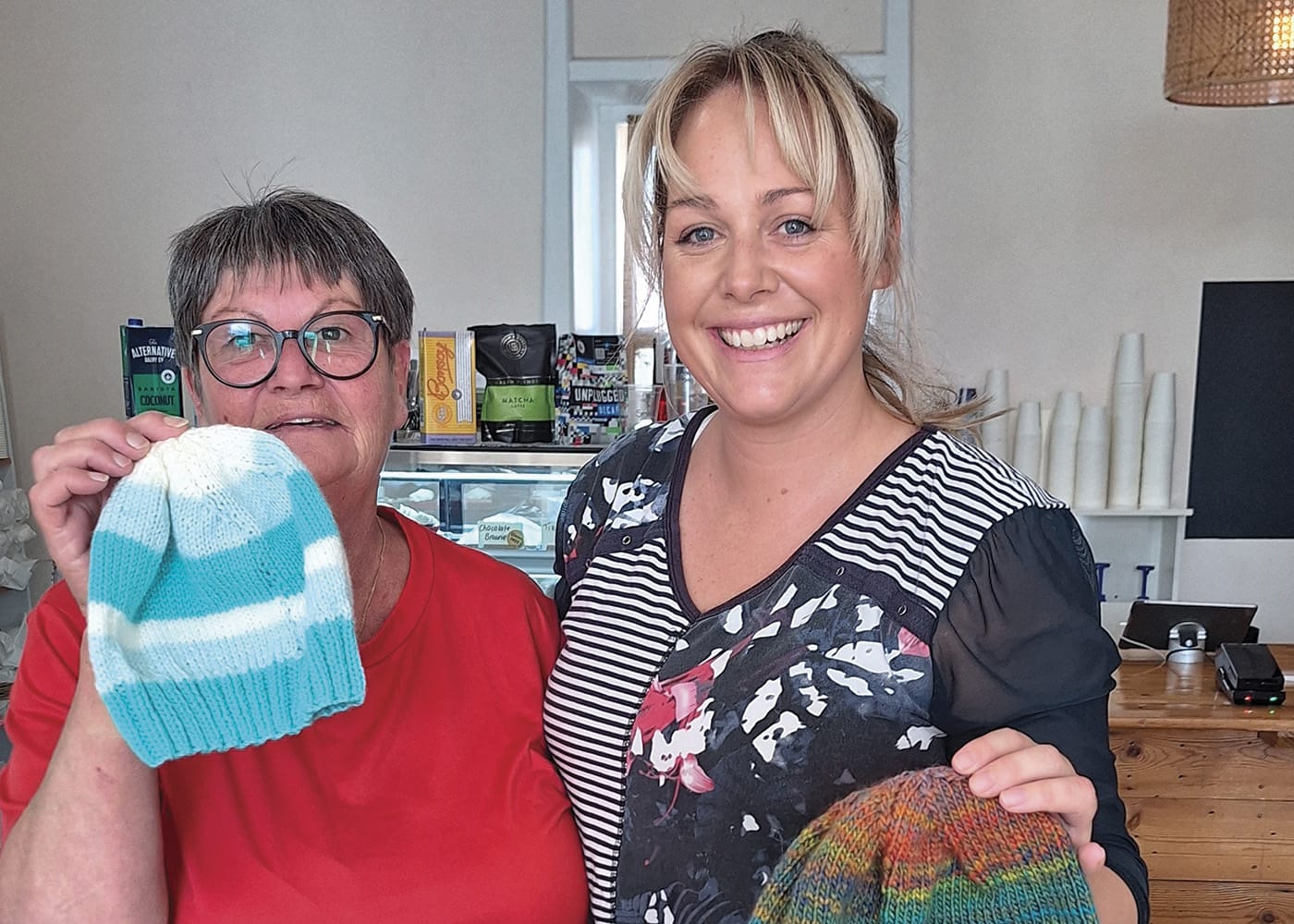SACWA members knit beanies for local children