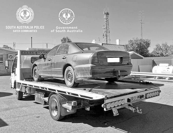 Woman allegedly drives at police – with infant in her car post image