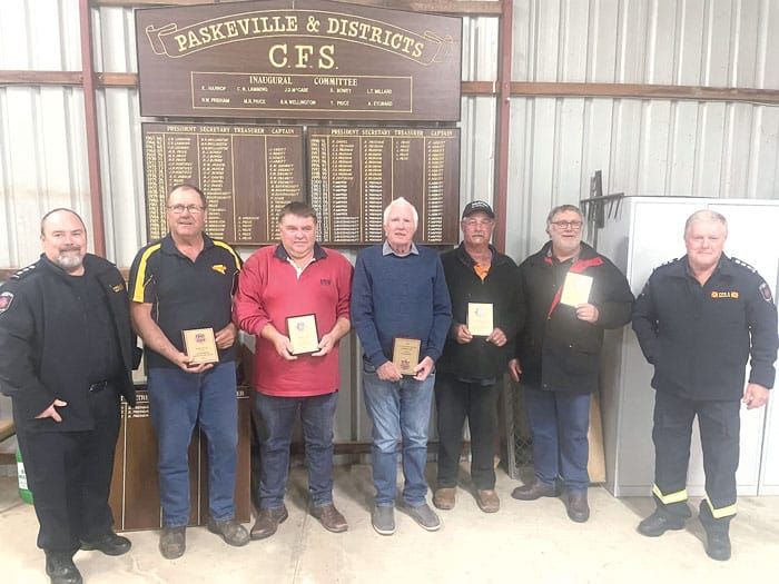 Long-serving firies thanked for their commitment post image