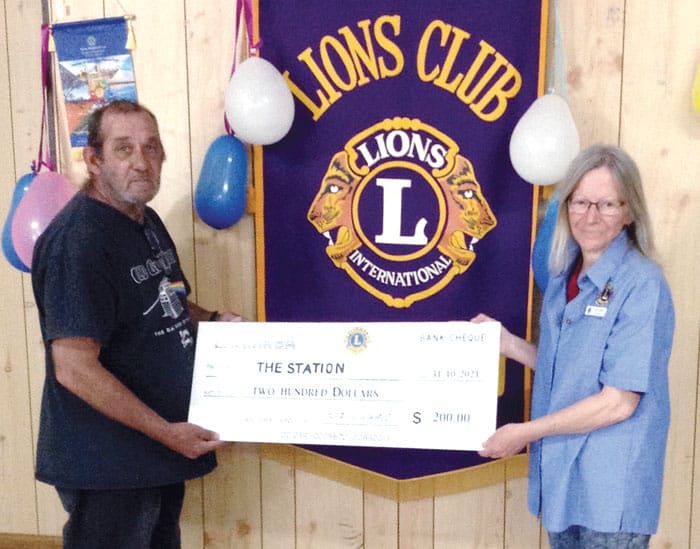 Lions donate to The Station post image