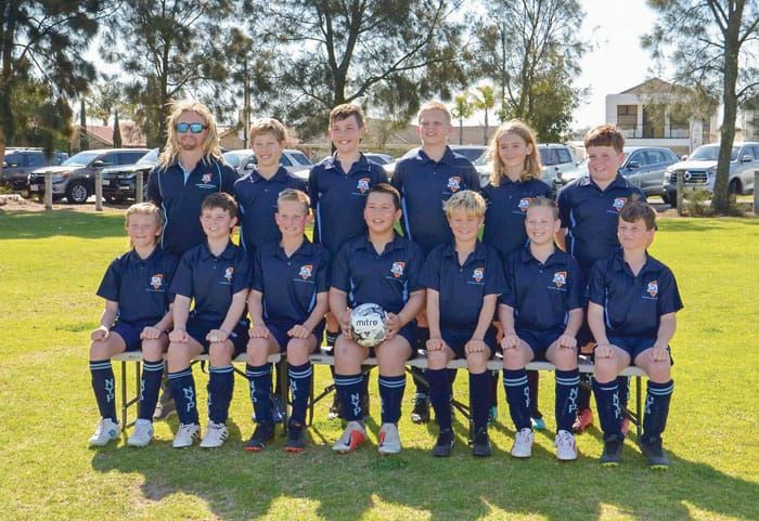 Regions combine to play soccer post image
