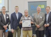Malcolm recognised for 50 years on the buses post image
