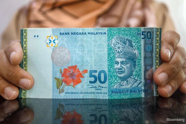 Ringgit dan dolar Taiwan mendahului lonjakan mata wang Asia yang sedang pesat membangun