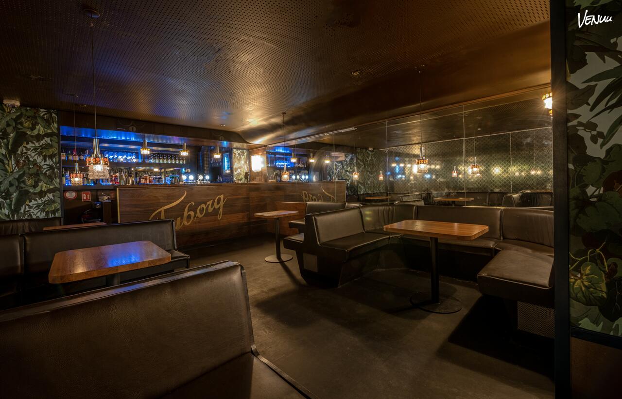 Billigt og råt festlokale i København med bodega-stemning og dansegulv