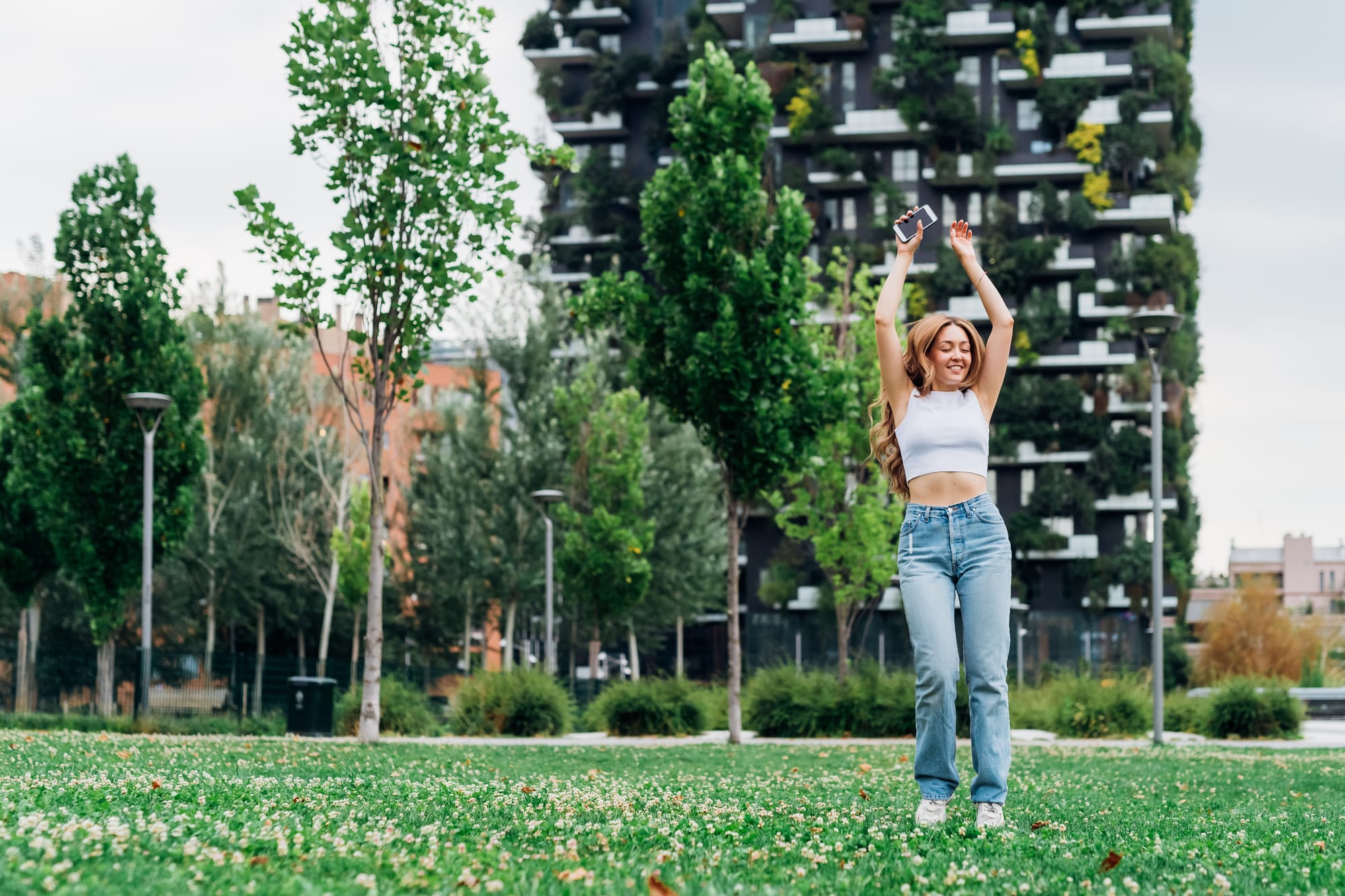 Greener Cities, Happier Lives Thoughtfully designed urban environments—with green spaces, vegetation-rich buildings, and walkable landscapes—enhance comfort, well-being, and the joy of everyday living in the city. Source: Envato Elements.