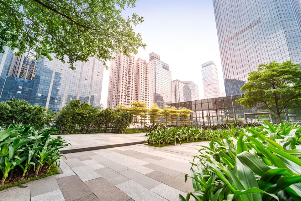 Modern cities embracing green infrastructure: integrating planting and permeability into dense urban environments. Source: Envato Elements.