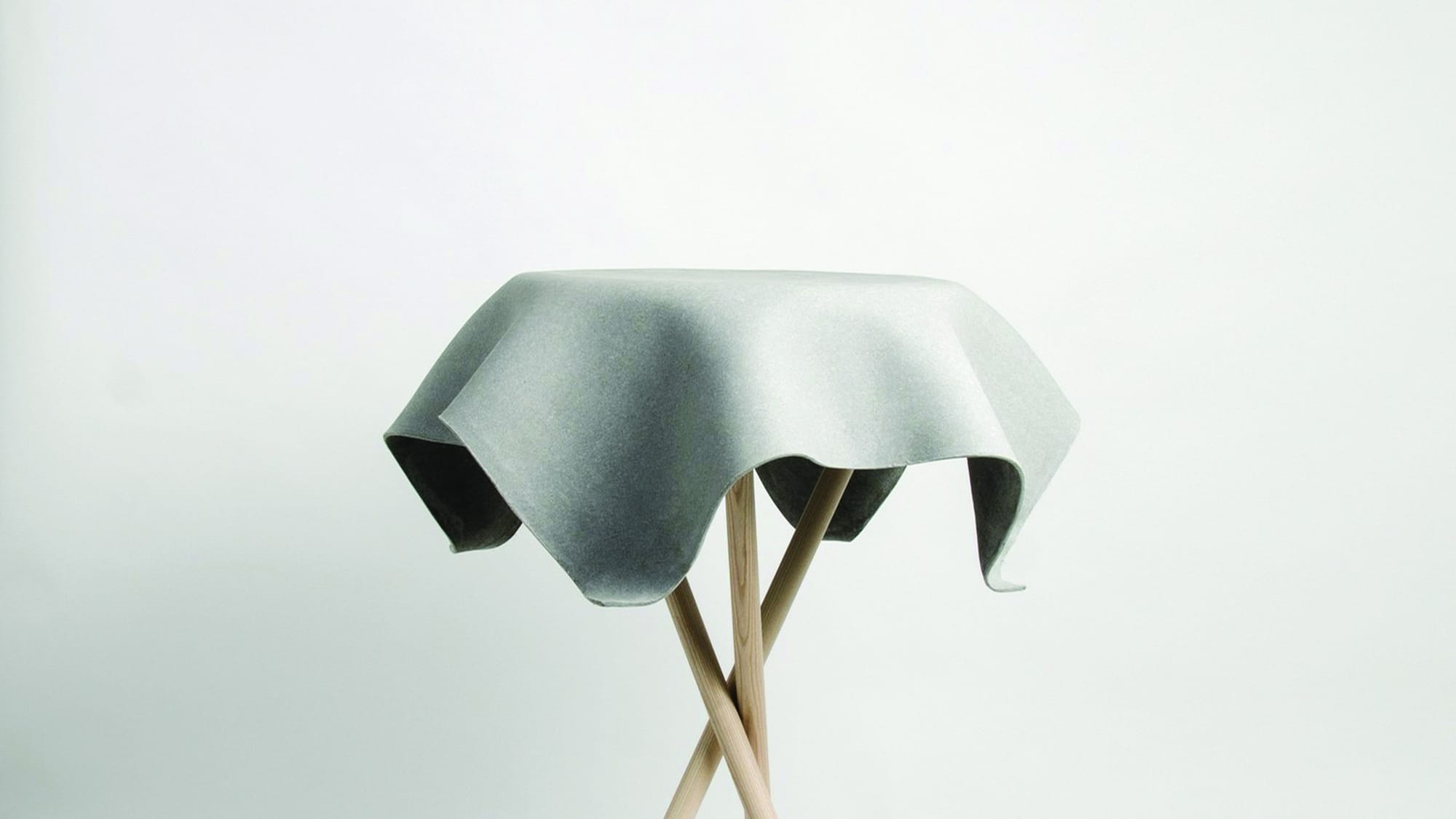 This Original Looking table By Swisspearl Stretches the Tensile Strength of Concrete