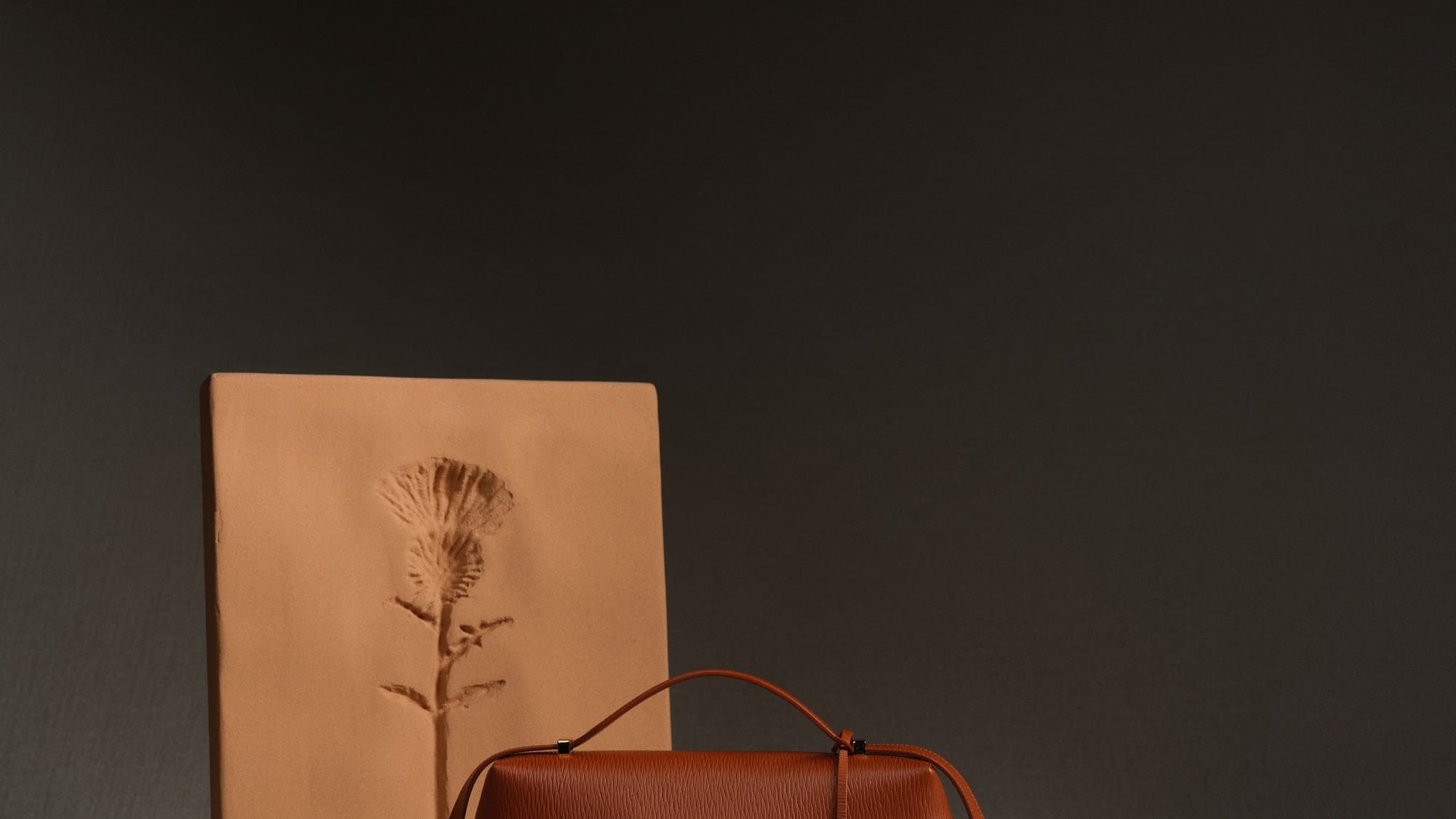 Low Key: The Quietly Luxurious Appeal of Loro Piana's Extra Pocket Bag