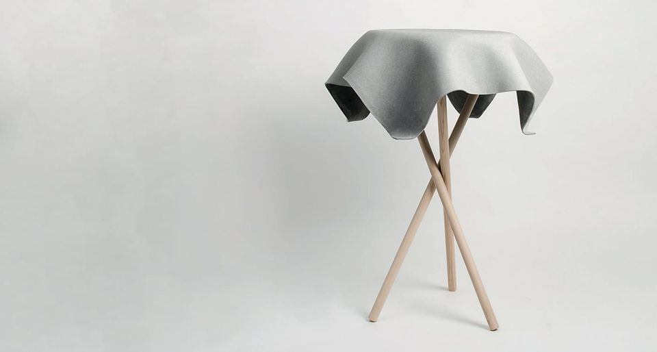 This Original Looking table By Swisspearl Stretches the Tensile Strength of Concrete