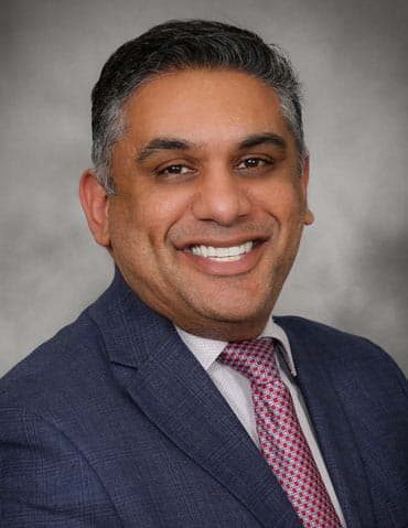 Tam Baig, Financial Advisor, Raymond James