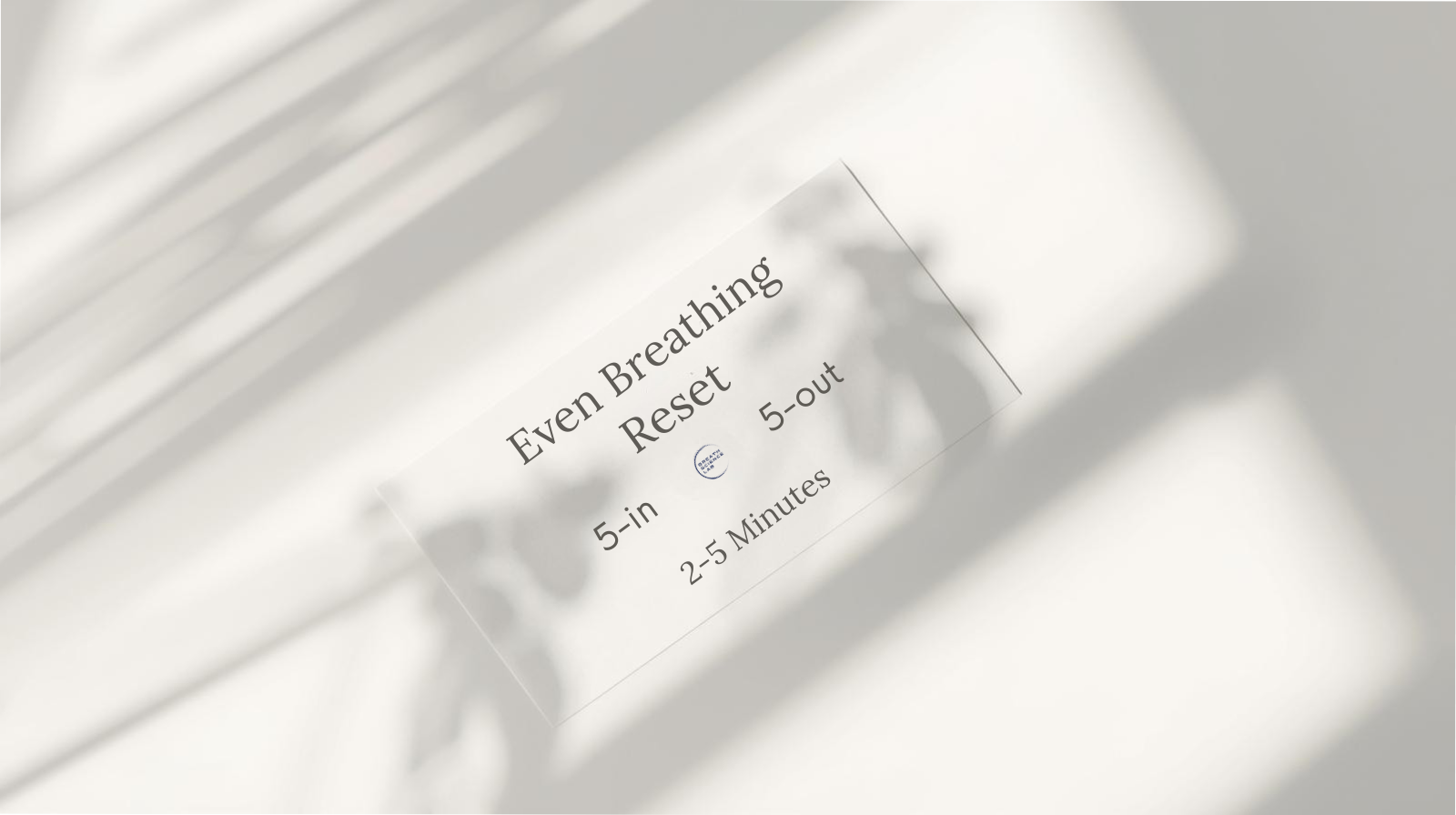 Simple instruction card for the Even Breathing Reset: breathe 5 seconds in, 5 seconds out, hand over heart.