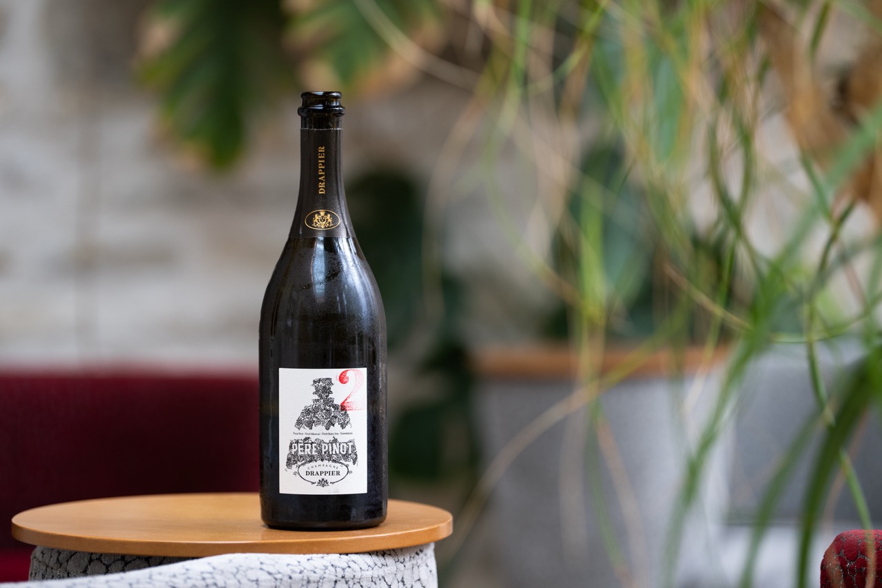 A bottle of Drappier Pere Pinot