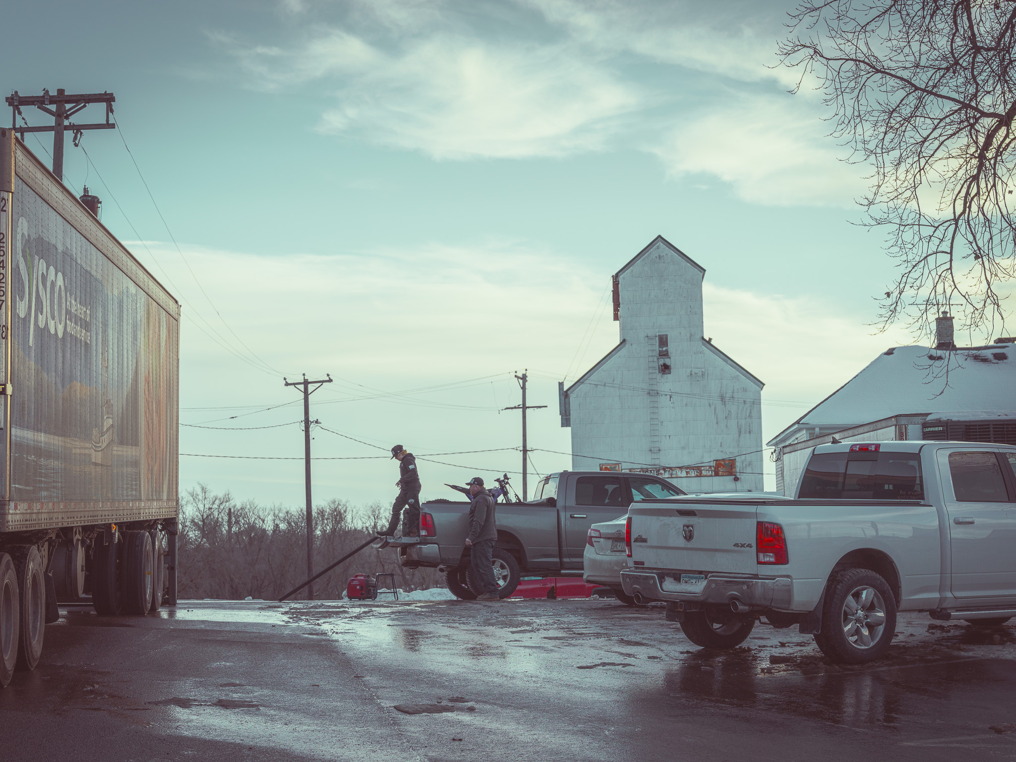 May be an image of silo and lumberyard
