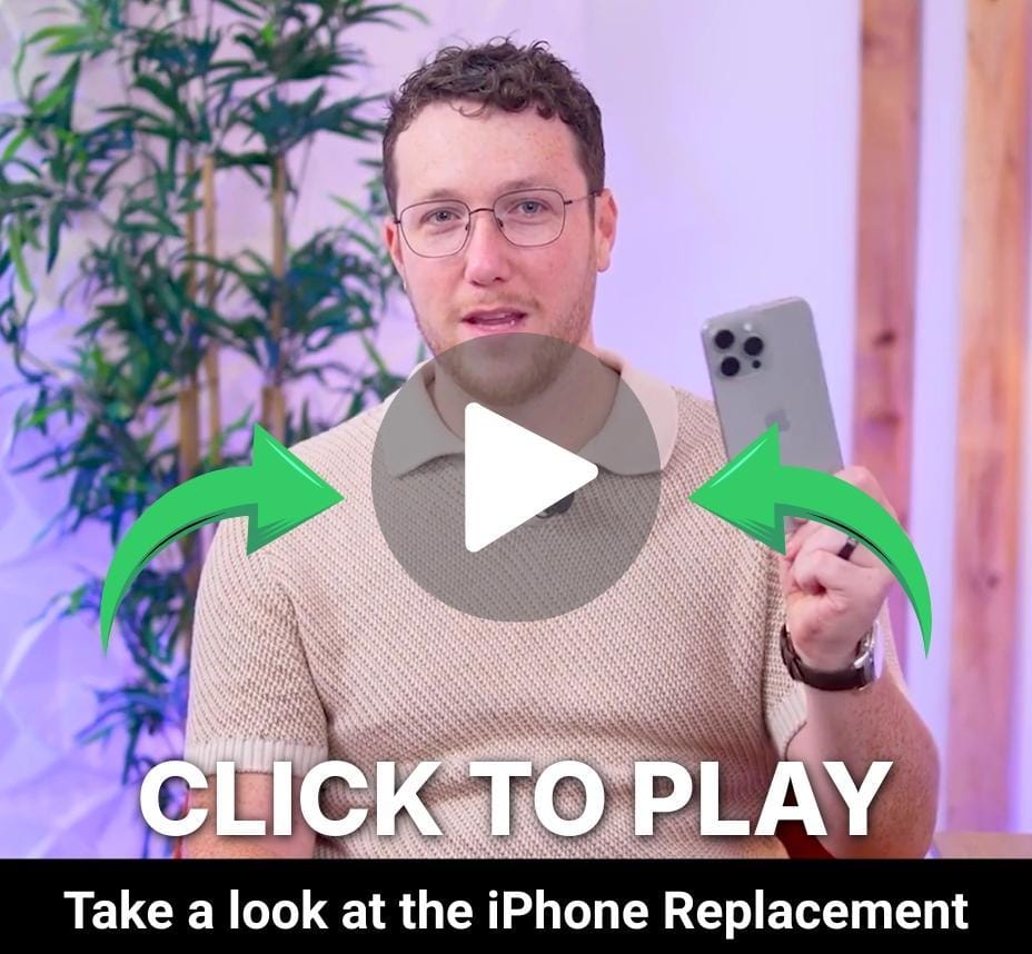 Man holding iPhone with play button