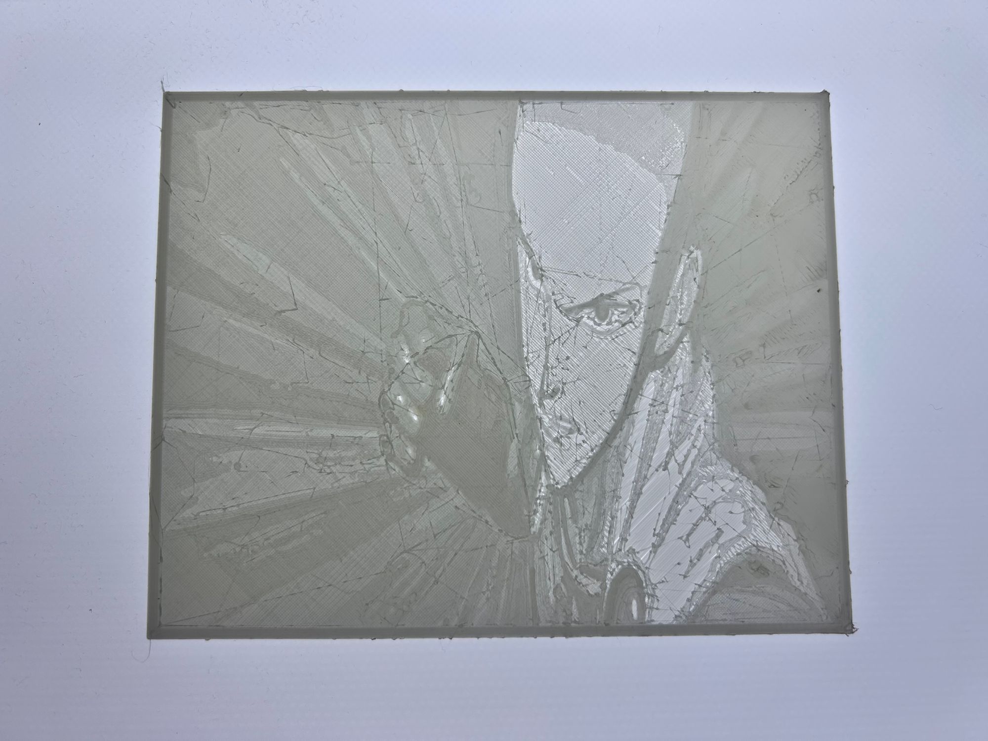 A grey rectangular object with a face

Description automatically generated with medium confidence