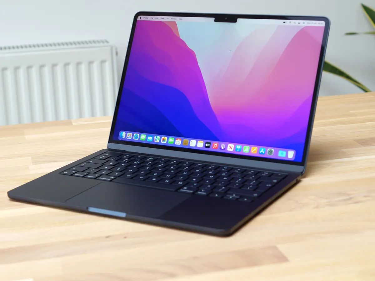 A computer on a table

Description automatically generated