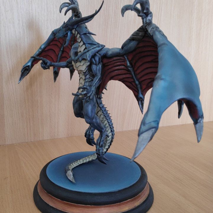 A statue of a dragon

Description automatically generated