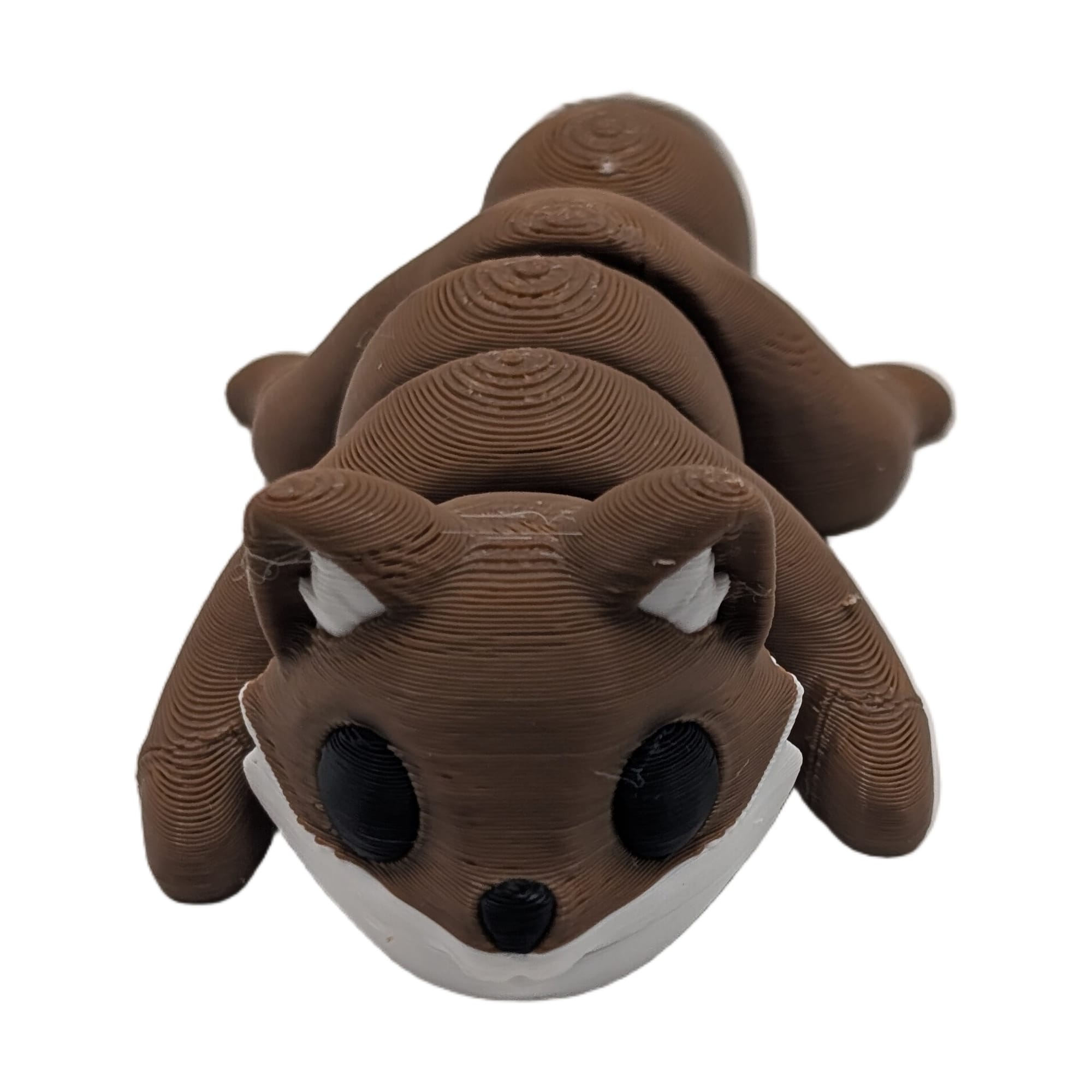 Hand-printed Spirit Pup figure — actual product photo, FDM print from Devon's studio