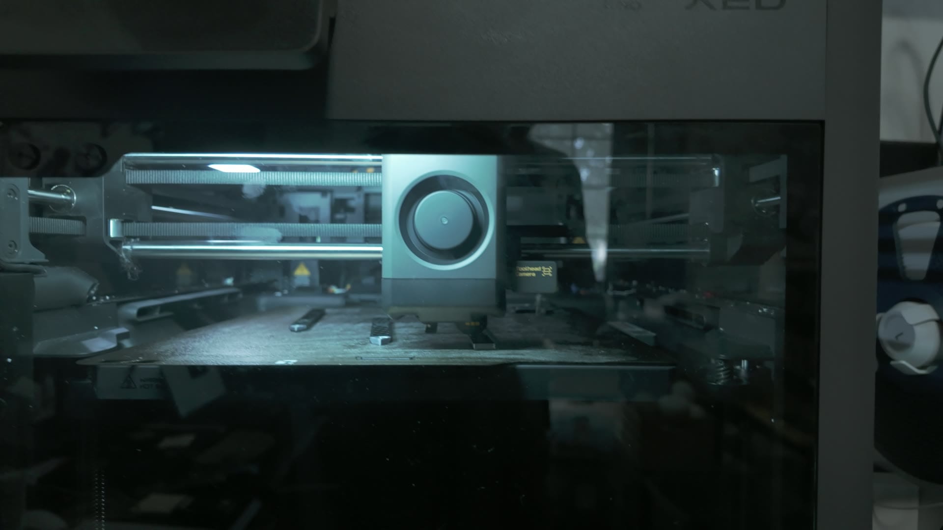 Bambu X2D printing cosplay sword parts on the build plate