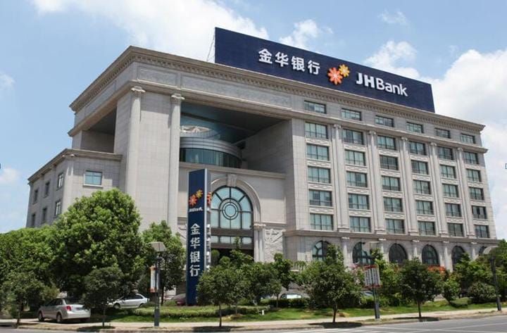 金华银行2026年经营目标曝光，张宁忙着转让不良贷款