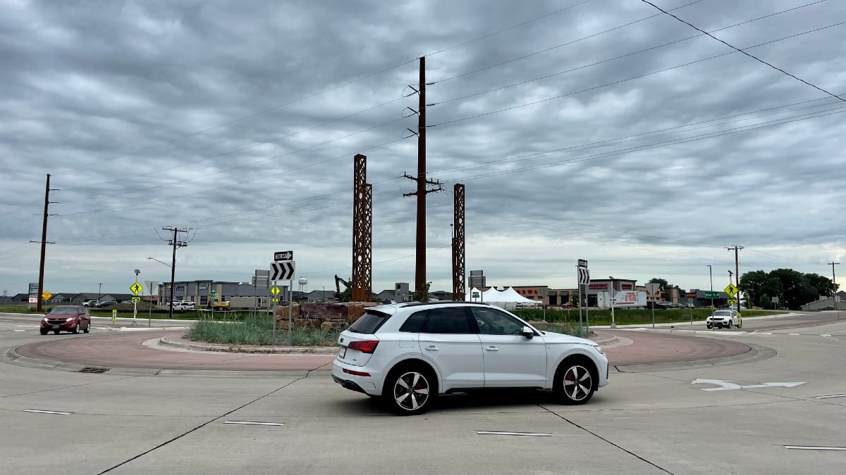 A car goes around a roundabout in Harrisburg, South Dakota.