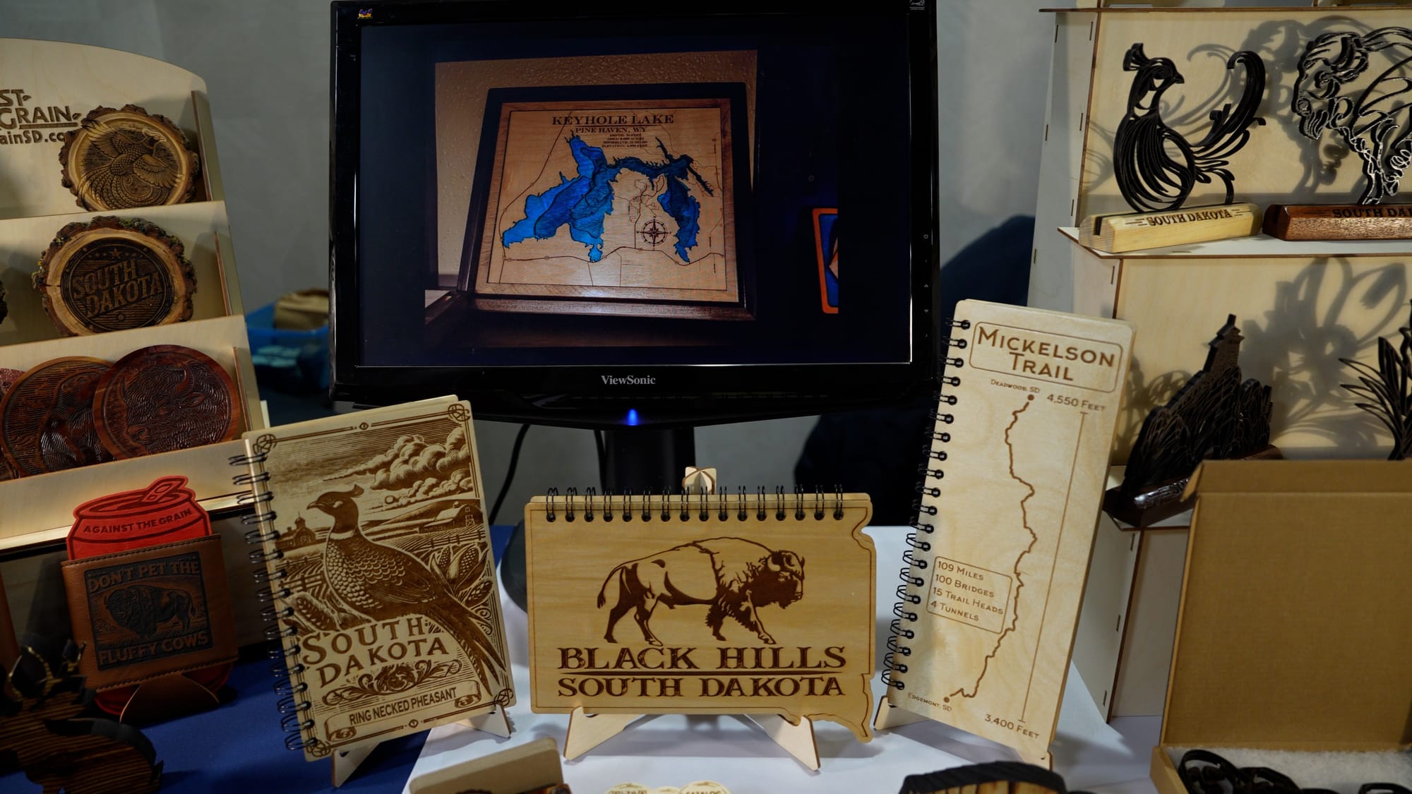 Woodworking art is displayed at the annual governor's conference.