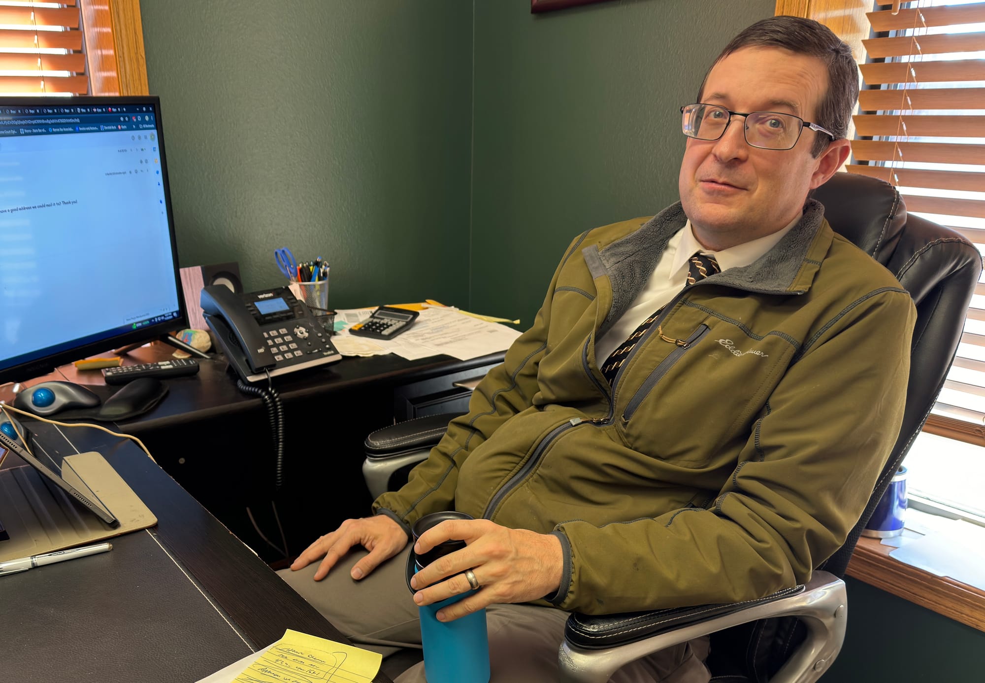 Attorney J. Scott James poses for a photo in his Custer, S.D., office in 2024. 