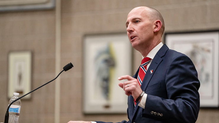 South Dakota attorney Neil Fulton speaks at a podium