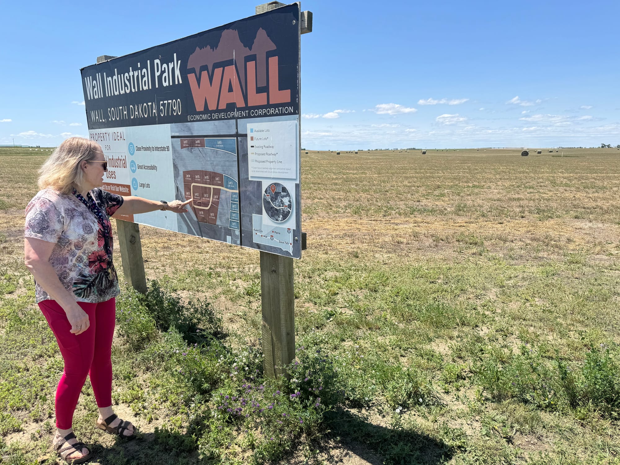 Wall, S.D., finance director Carolynn Anderson, shown on June 23, 2025, shows where lots are ready for development in the Wall Industrial Park on the north side of the city. 