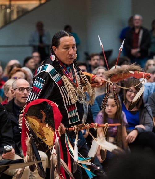 Bryan Akipa, a Dakota flautist who has also composed music for the program, performs a dance with the Lakota Music Project. (Photo: Tracy Salazar)