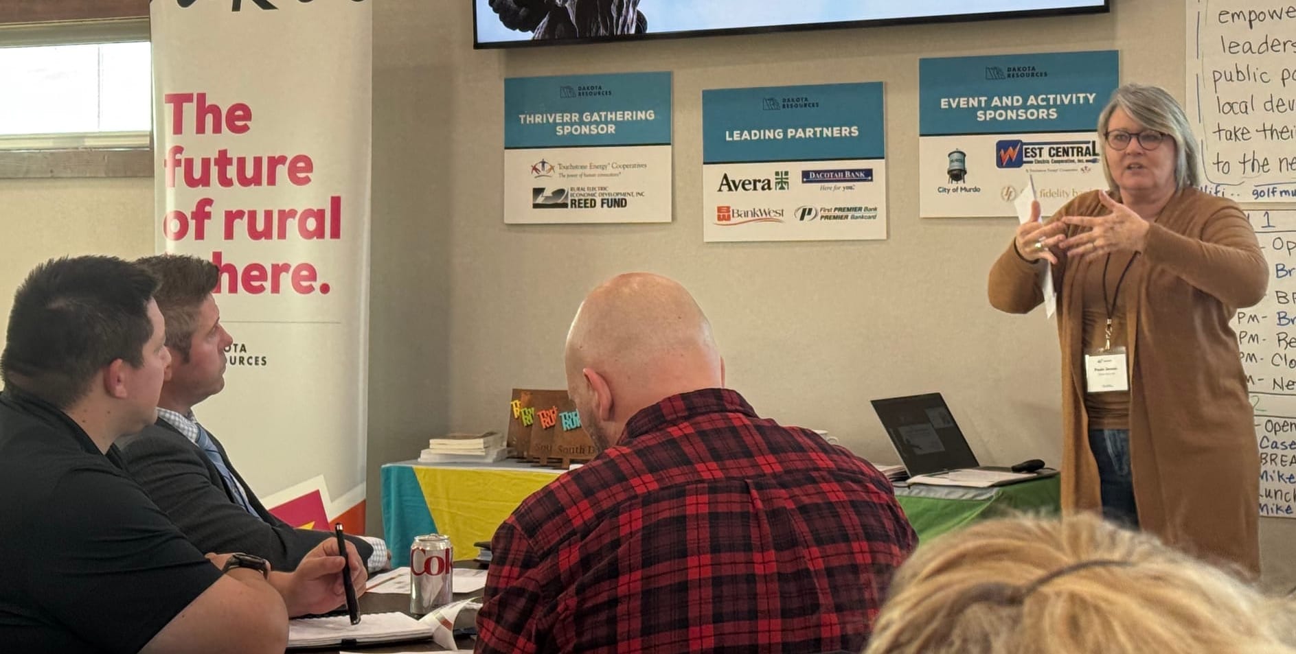 Dakota Resources community coach Paula Jensen, right, speaks to local economic development leaders who attended an idea-sharing meeting in Murdo, S.D., on Nov. 12, 2025. (Photo: Bart Pfankuch / South Dakota News Watch)
