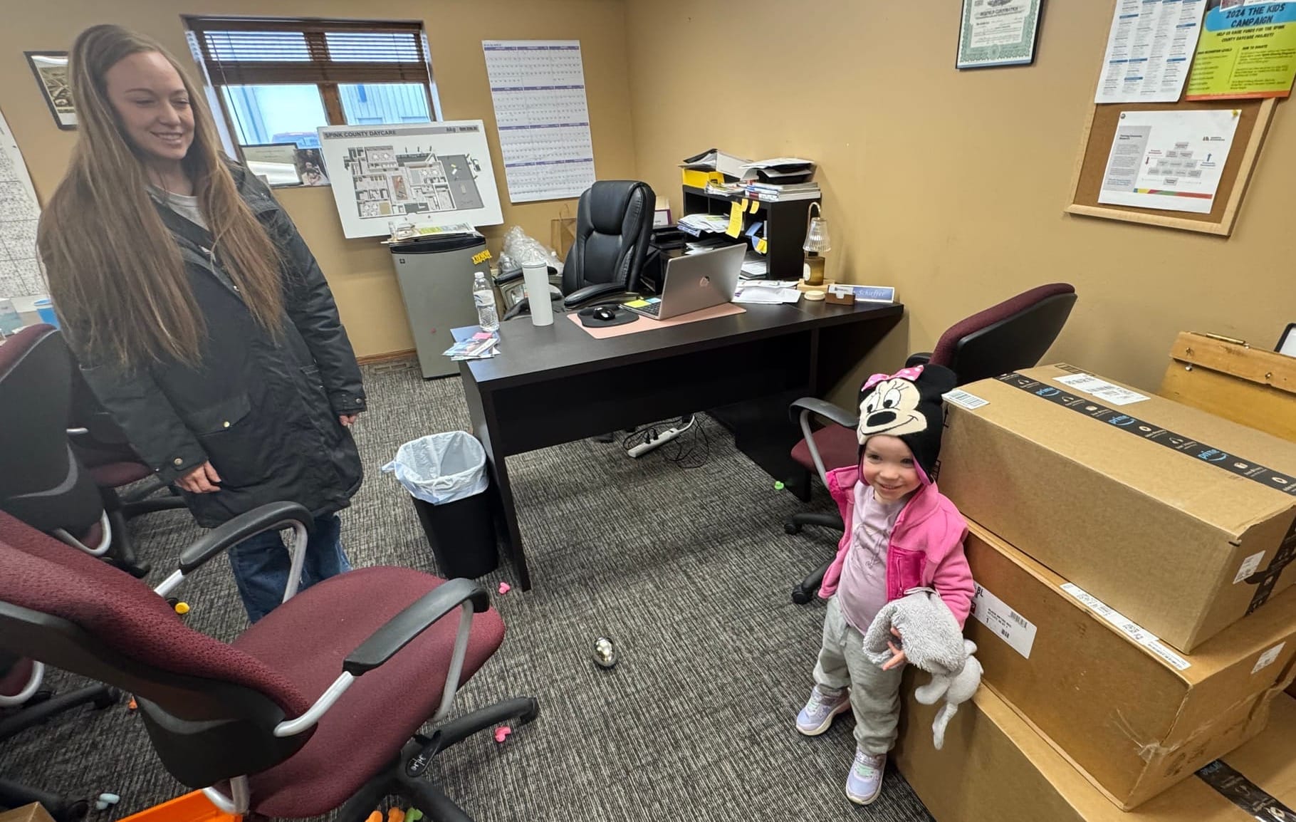Redfield Area Development Corp. director Gianna Schieffer brought daughter Maya to work in Redfield, S.D., on Feb. 3, 2026,
