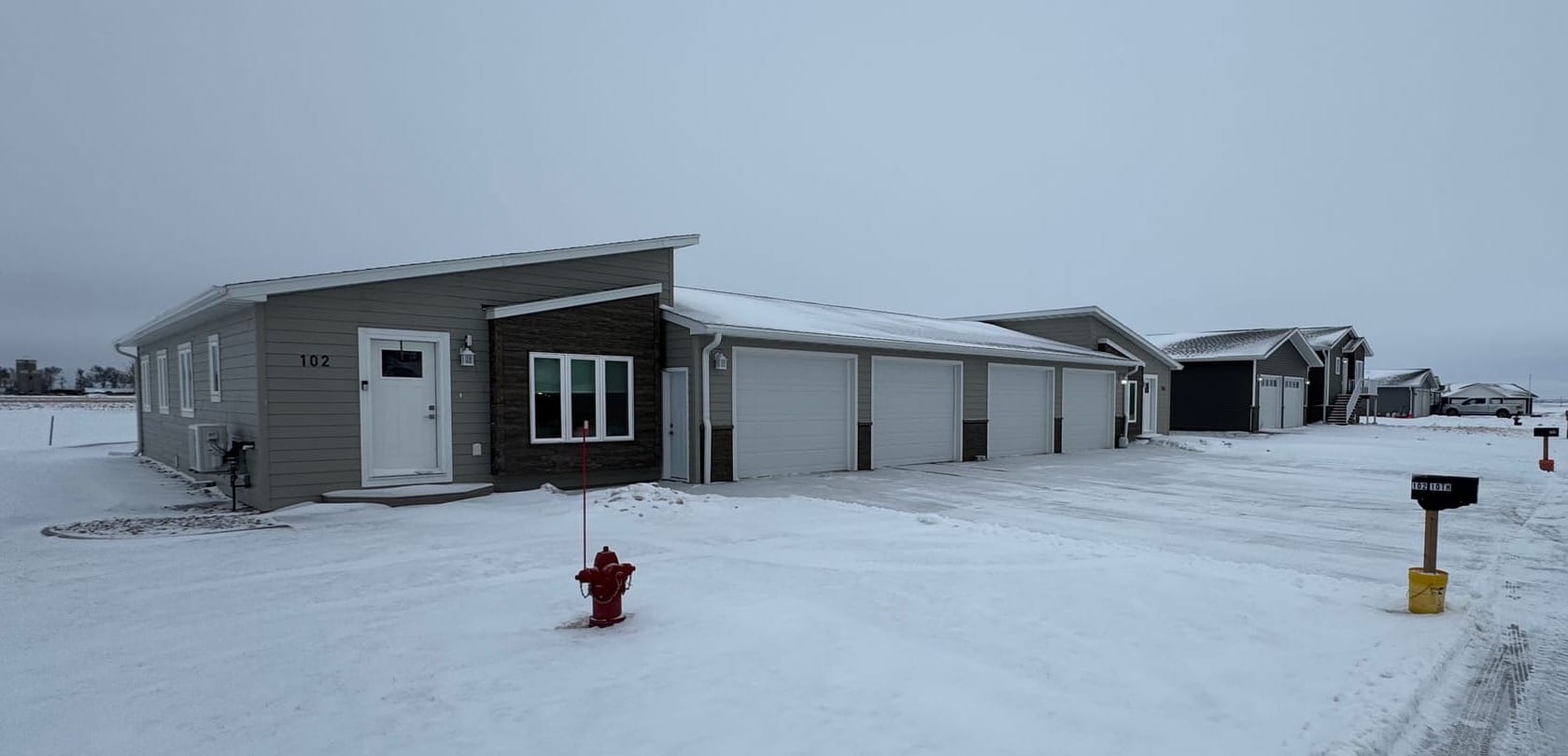 This "Dakotaplex" twin home, shown Feb. 3, 2026, is one of the homes from the state Governor's House Program that have helped lure new families to Herreid, S.D.