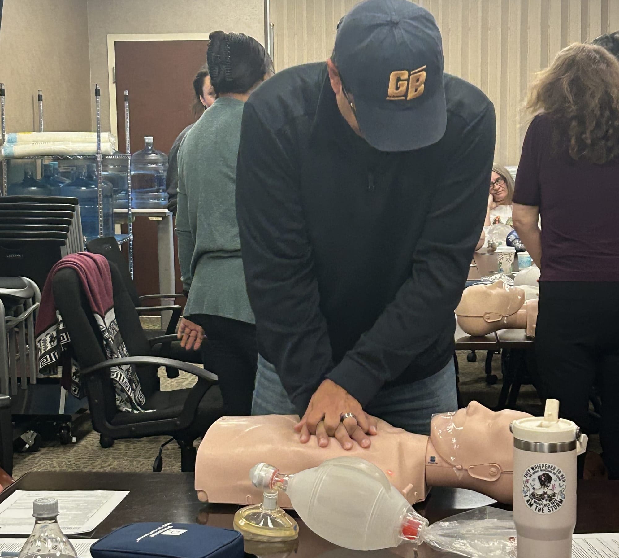 A man practices CPR as part of a Missouri Breaks-led demonstration. (Photo: Missouri Breaks Industries Research)
