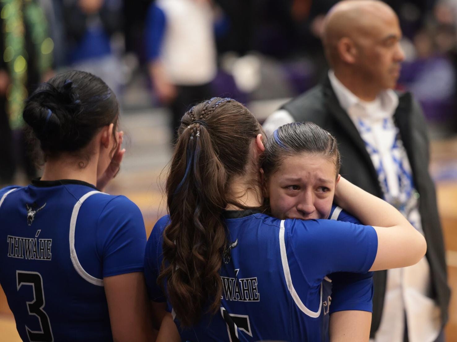 Mahpíya Lúta girls basketball's Ashlan Carlow-Blount tears up during the Class A title during pre-game ceremonies