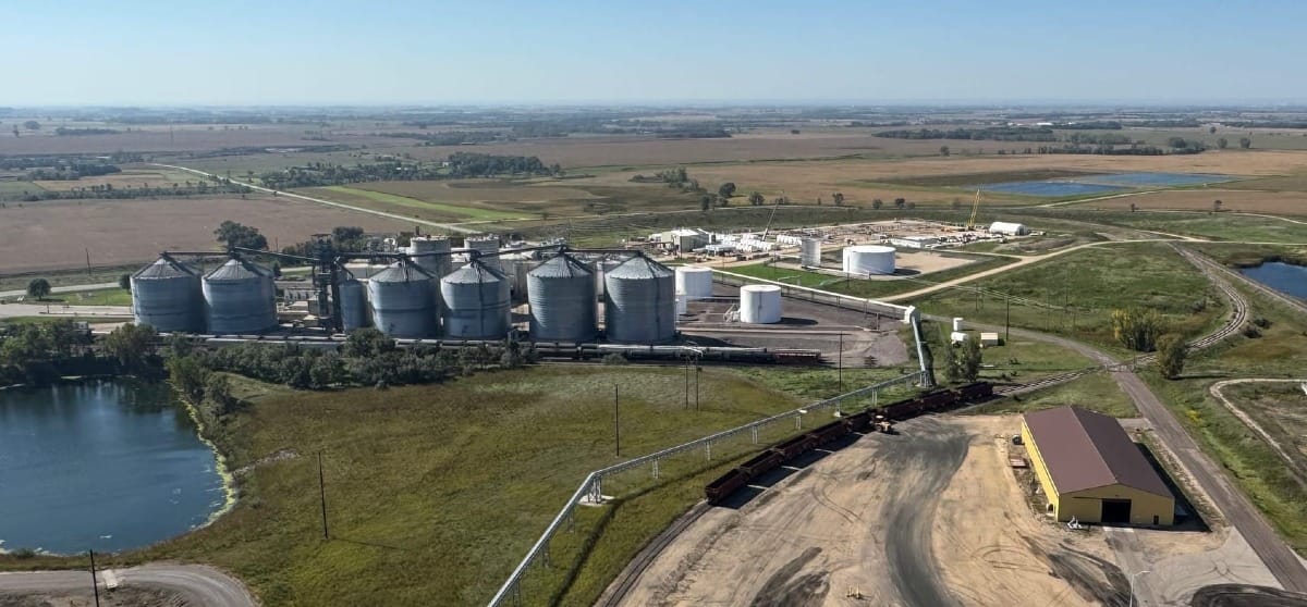 This image taken on October. 25, 2025, from the roof of the nearby Otter Tail power plant shows the Poet Biofuels plant and its grain bins on the left and the Antora Energy plant under construction