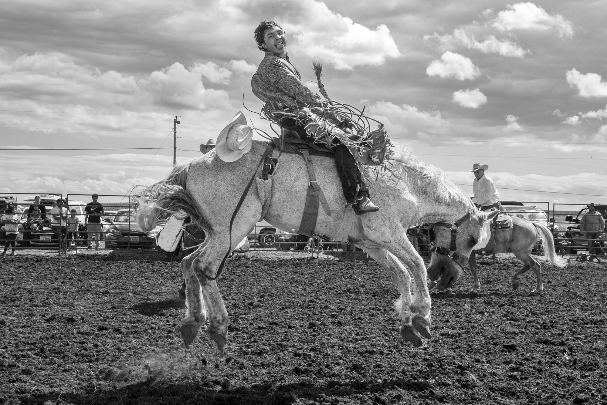 C.J. Jewett on the back of a bucking bronc at the Owl Bonnet Rough Stock Rodeo in St. Francis, S.D.