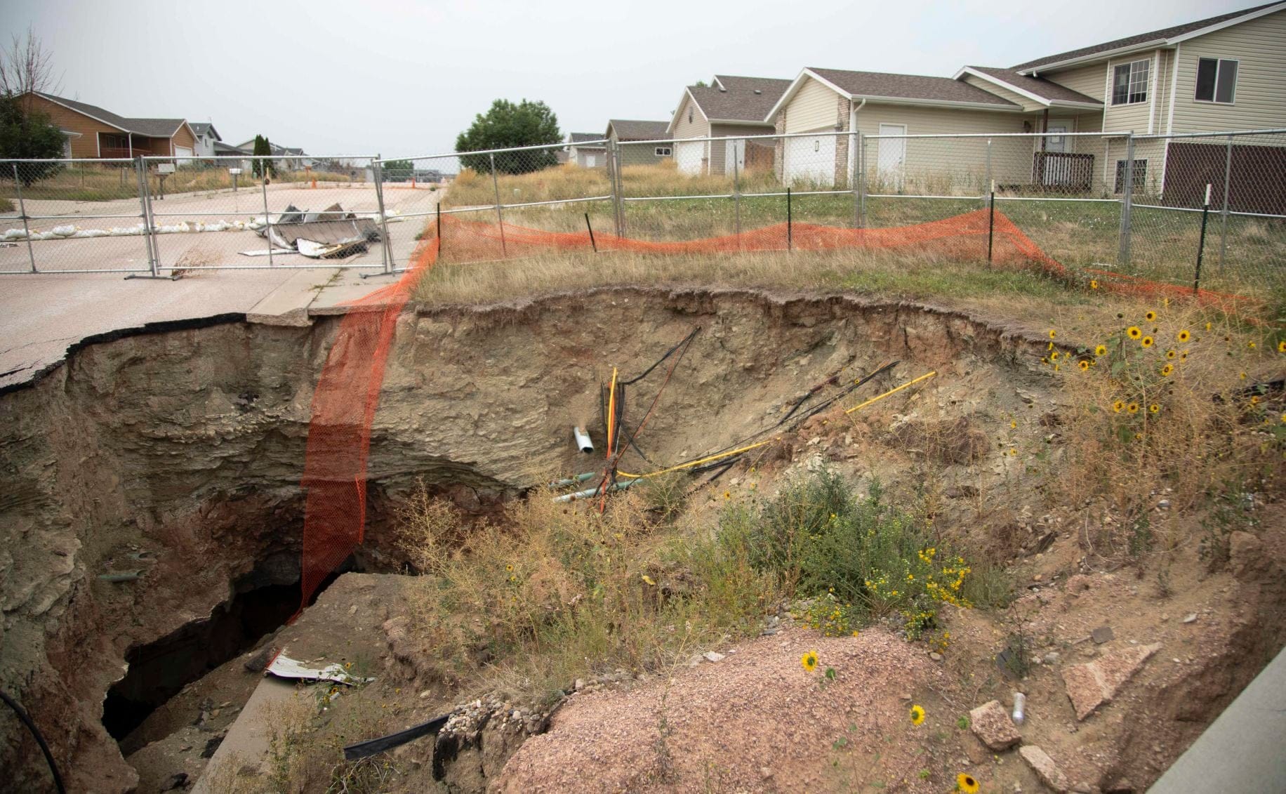 The sinkhole that opened in the Hideaway Hills neighborhood in Black Hawk, S.D., is shown shortly after the collapse in April 2020.