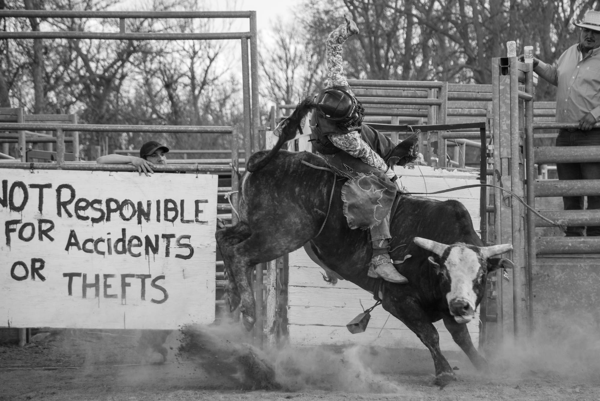 A rider on the back of a bull at the Three Mile Creek Easter Egg Hunt and Bull Riding event in Kyle, S.D.