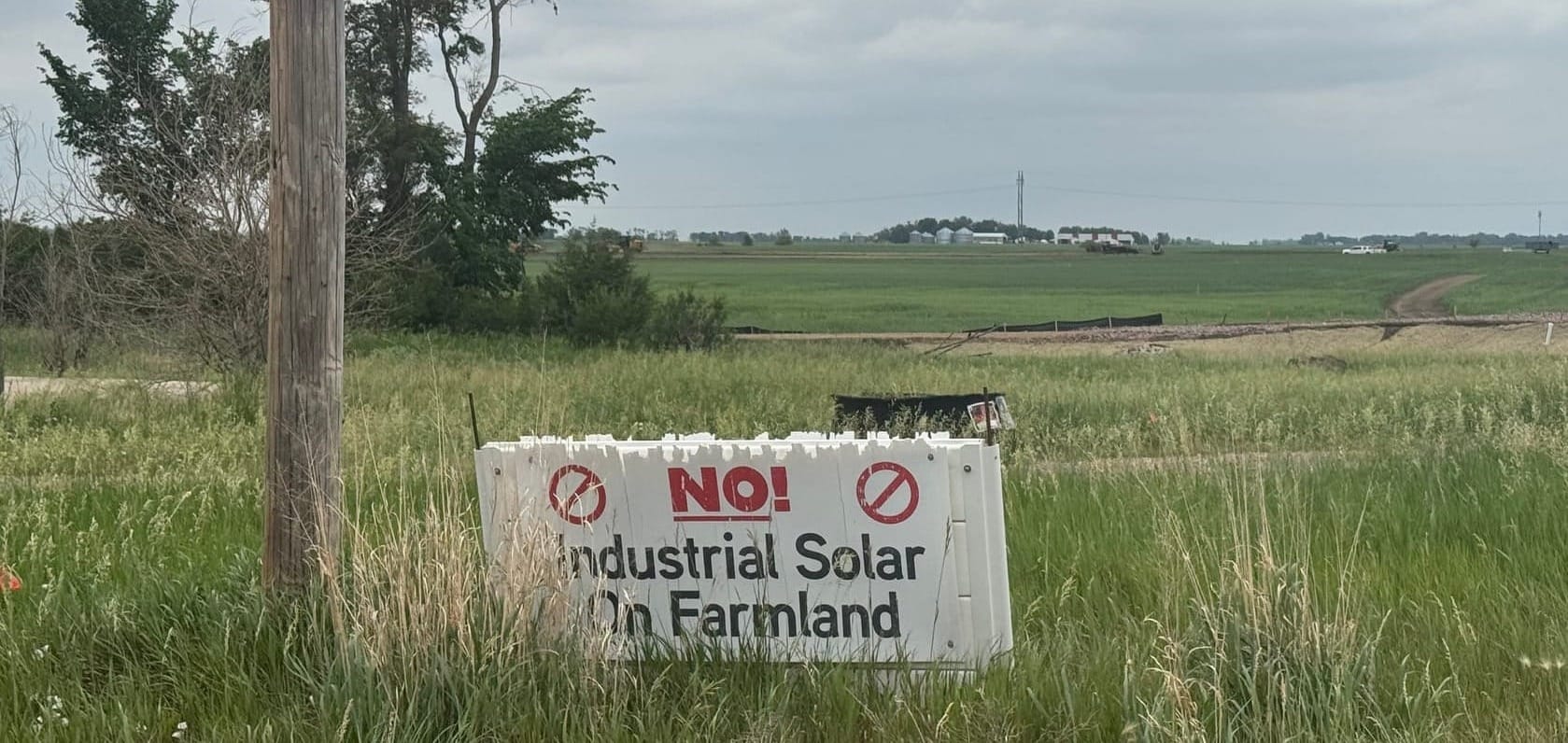 An opposition sign is shown on June 8, 2026, at a property on state Highway 42 just south of where the Grant Solar project is now under construction near Canistota, S.D.