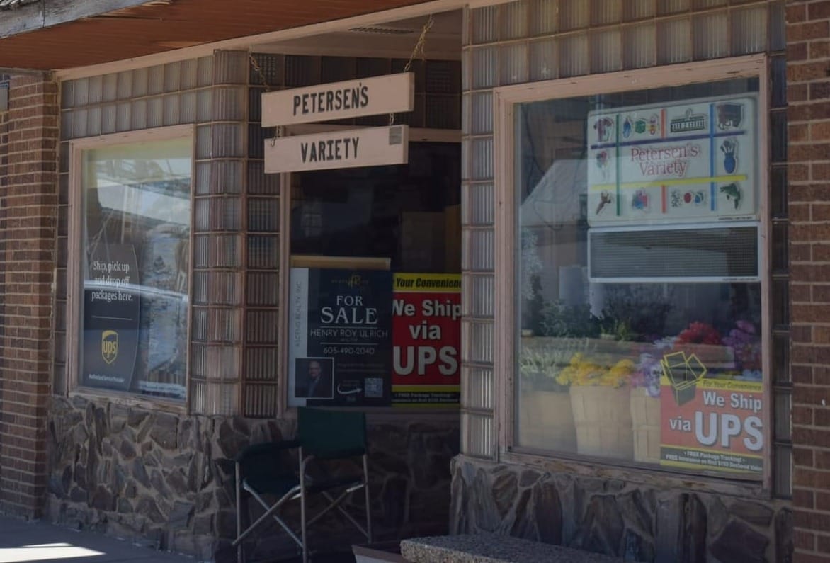 Petersen's Variety in Philip, S.D., on May 2, 2026. The store advertises that residents can deliver and pick-up mail from UPS at the site.