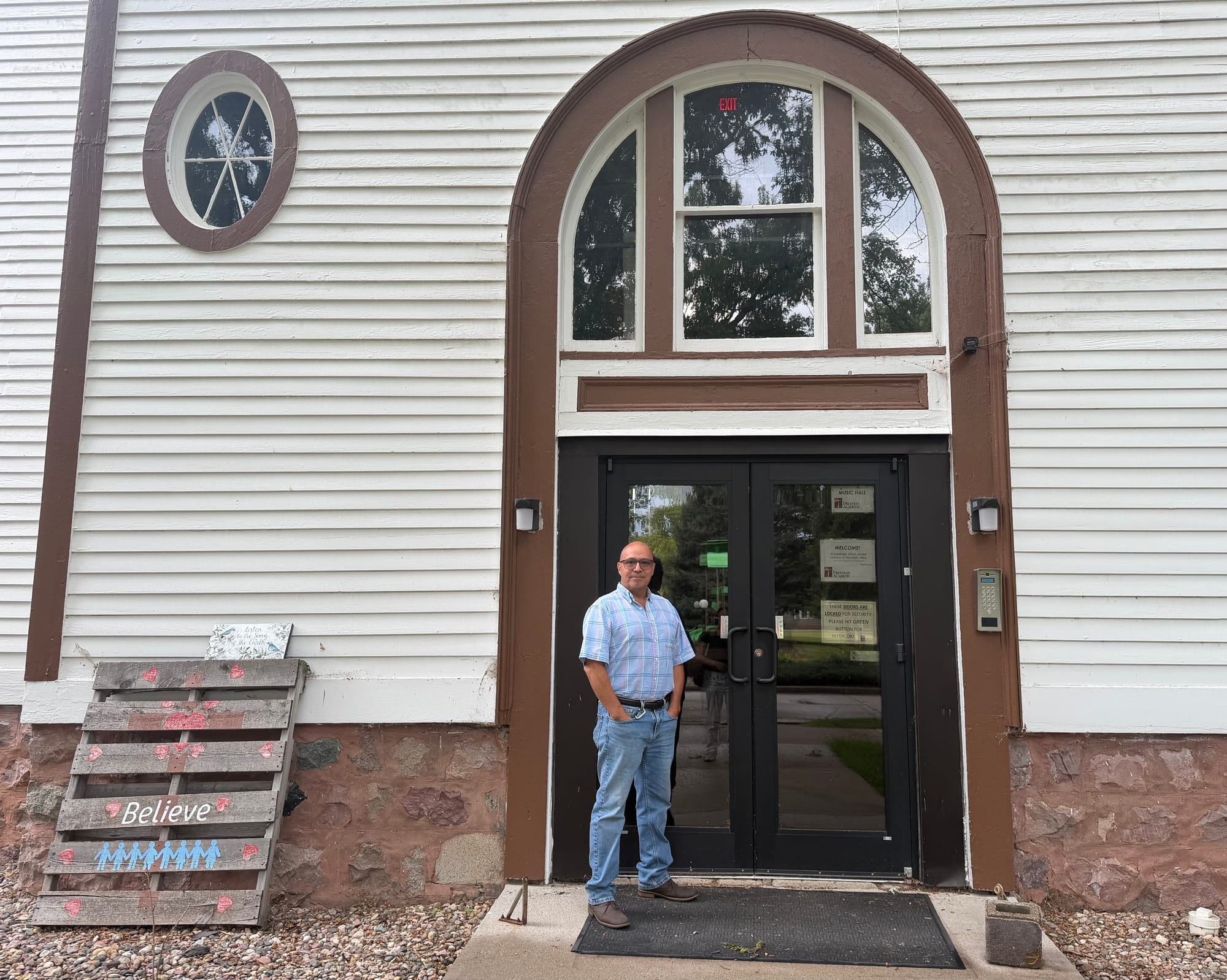 Matthew Tschetter by Freeman Academy's music hall