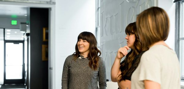 An inclusive leader welcomes new employees during the onboarding process