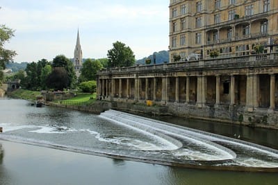 It’s the River Avon in Bath with some shallow artificial cascades. There’s some pretty architecture with columns & stuff along the river, too.