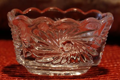 It’s like a pressed glass bowl with a pinwheel pattern on it.