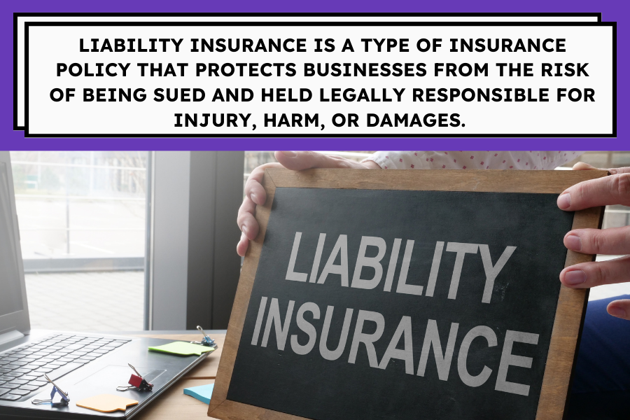 Chalkboard with 'Liability Insurance' text held by hands