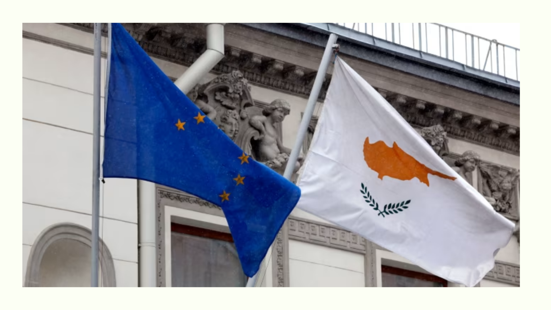 European Union flag next to the Cyprus flag waving outside a building, symbolizing the relationship between the EU and Cyprus