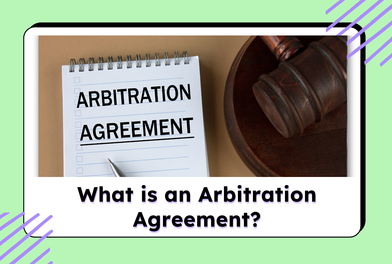 Notebook with 'Arbitration Agreement' and a judge's gavel on a desk