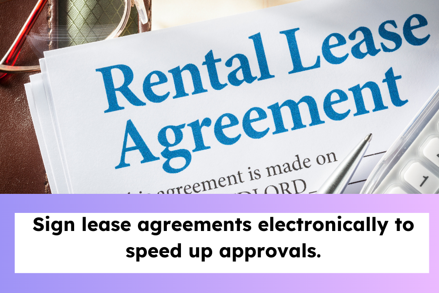 Rental lease agreement document with a pen.