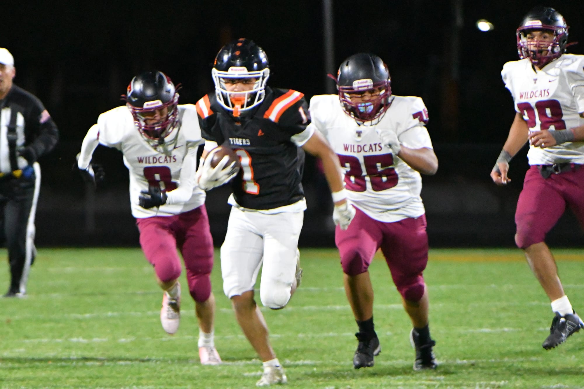 Hunter Mills (1) finds an open lane as the Wildcats give chase.